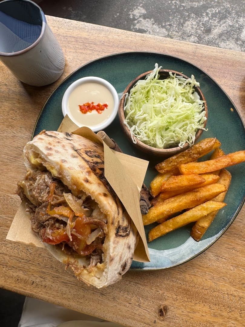 Beef arayes with fries and cabbage salad